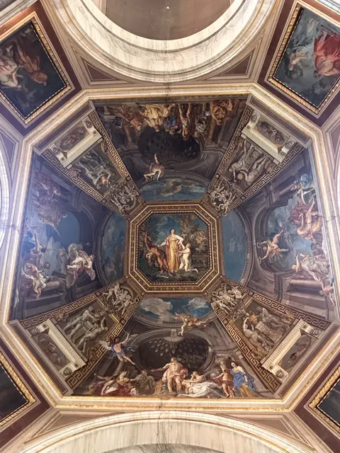 An elaborate painted church ceiling.