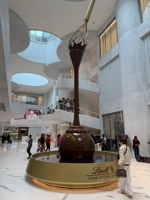 The towering chocolate fountain inside the Lindt museum.